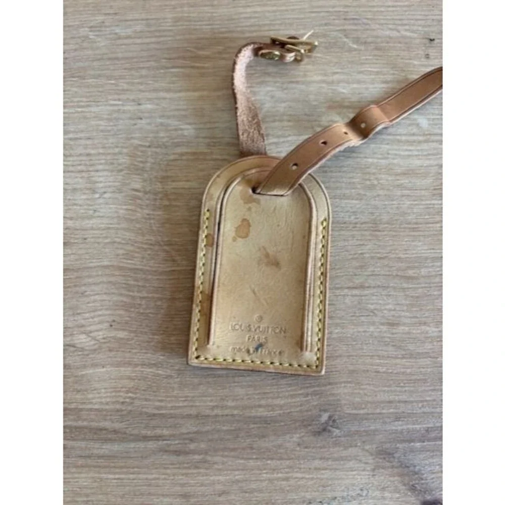 Louis Vuitton id tag  Luggage